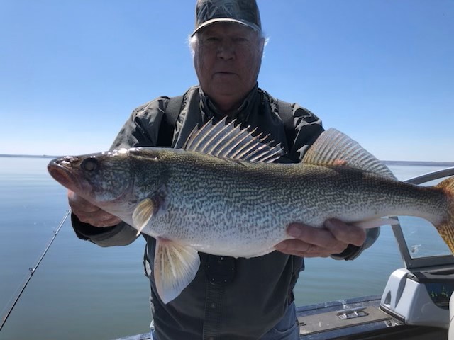 Man Holding A Fish